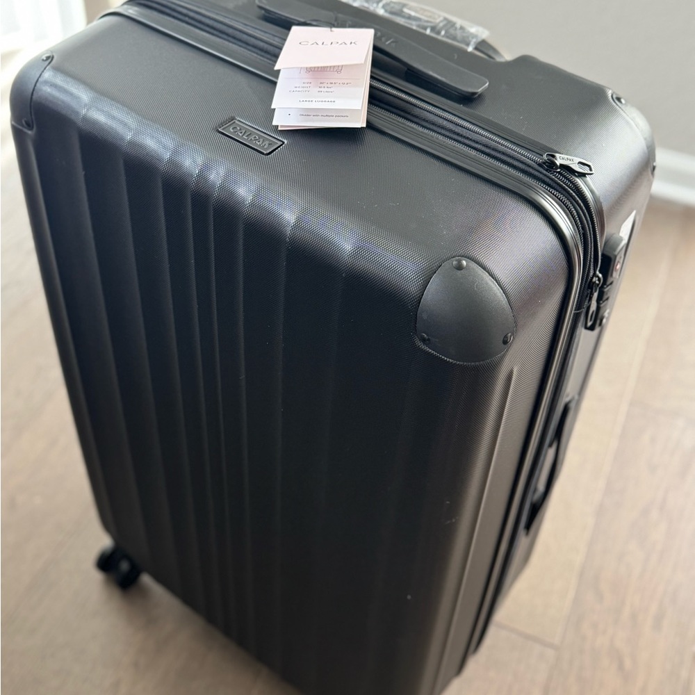 New! CALPAK 30” Check-in Large Hardside Spinner Black Luggage